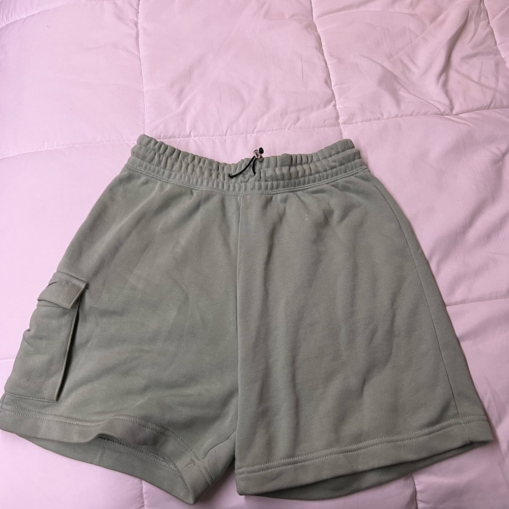 Green Nike shorts